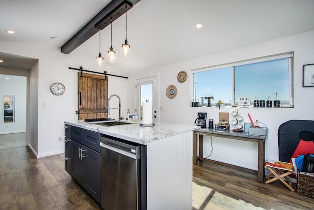 kitchen with stainless steel dishwasher, a center island with sink, decorative light fixtures, dark hardwood / wood-style floors, and a barn door