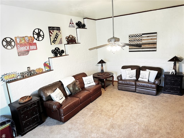 carpeted living room featuring ceiling fan