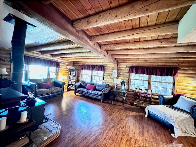 living room with log walls and plenty of natural light