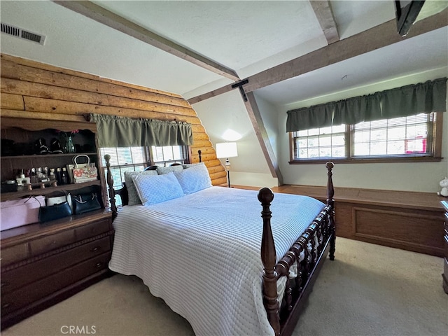 carpeted bedroom featuring vaulted ceiling with beams