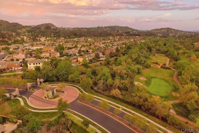 aerial view at dusk with a mountain view