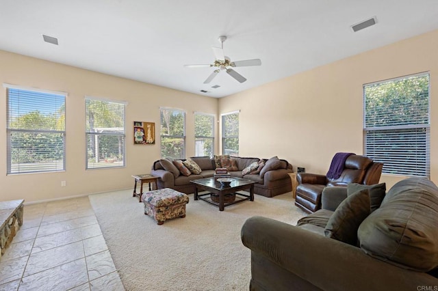 living room with visible vents and ceiling fan