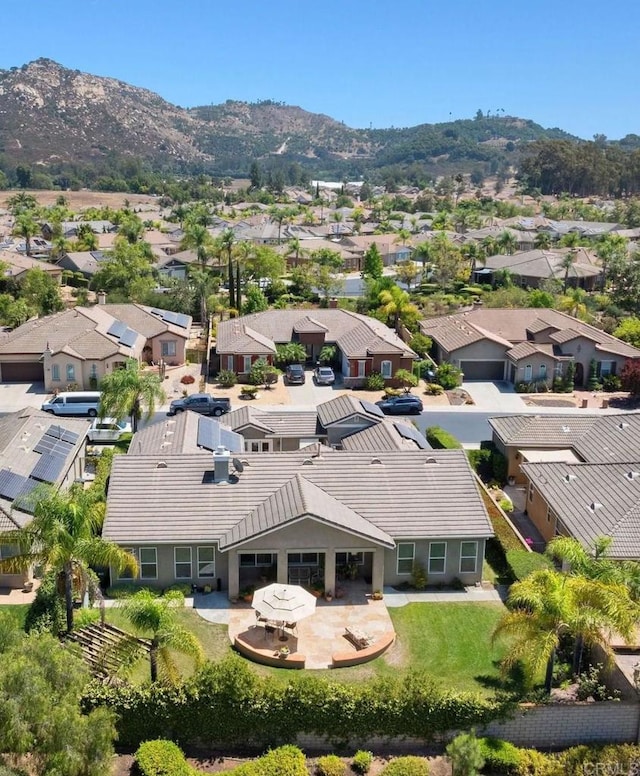 bird's eye view featuring a residential view and a mountain view