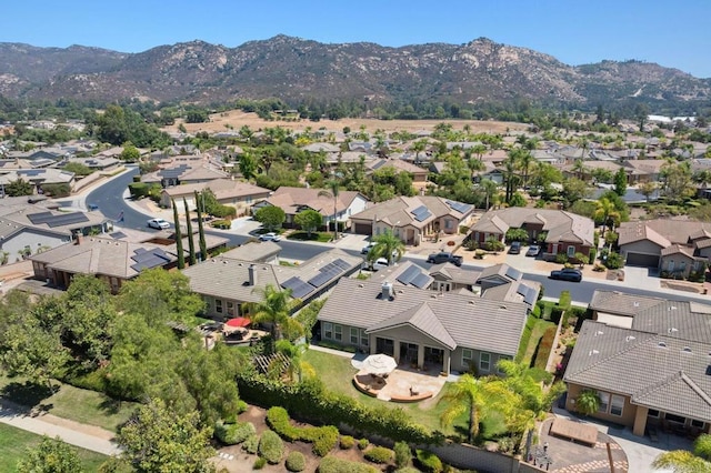 birds eye view of property with a residential view and a mountain view