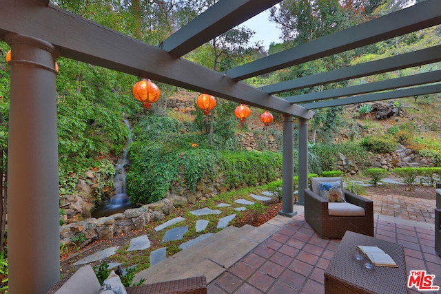 view of patio featuring a pergola