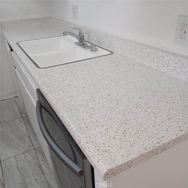 details featuring sink and black dishwasher