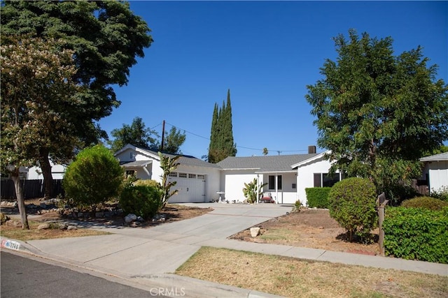 single story home featuring a garage