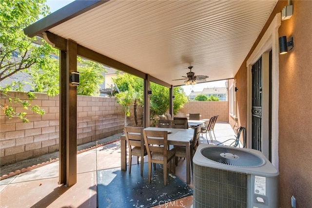 view of patio featuring central AC unit and ceiling fan