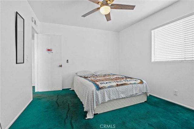 carpeted bedroom featuring ceiling fan