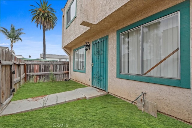 view of home's exterior featuring a lawn