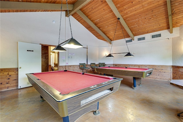 recreation room with concrete flooring, wood walls, beam ceiling, and high vaulted ceiling