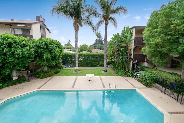 view of pool featuring a patio area