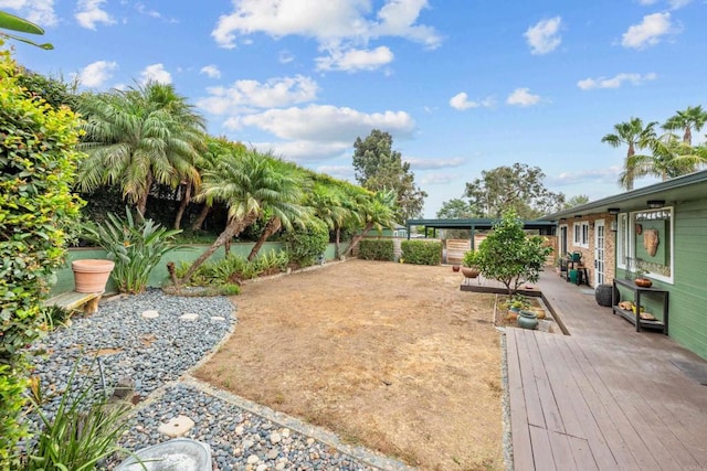 view of yard featuring a deck