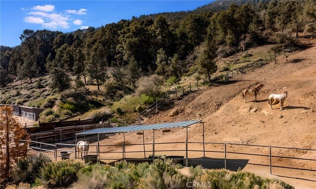 property view of mountains featuring a rural view