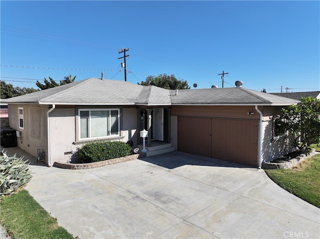 single story home with a garage