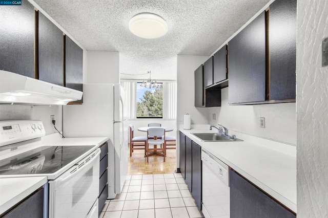 kitchen featuring light tile patterned flooring, sink, white appliances, range hood, and a notable chandelier