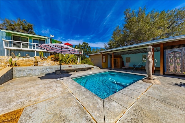 view of pool featuring a patio