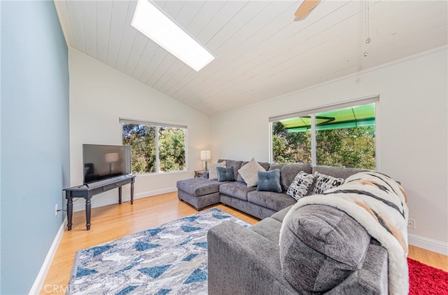 living room with wood ceiling, light hardwood / wood-style floors, and lofted ceiling