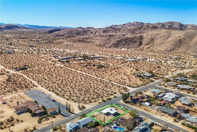 bird's eye view with a mountain view