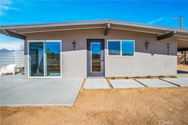 exterior space with a patio area