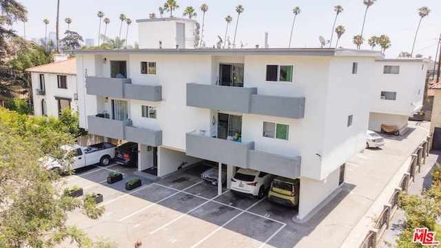 view of building exterior with a carport