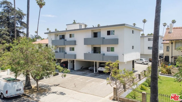 view of property featuring a carport