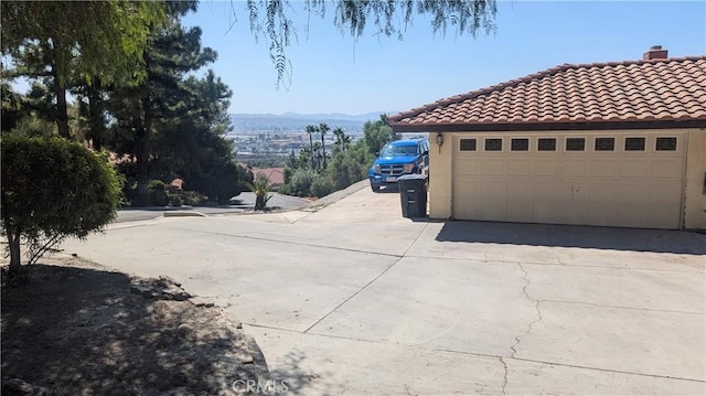 exterior space featuring a mountain view