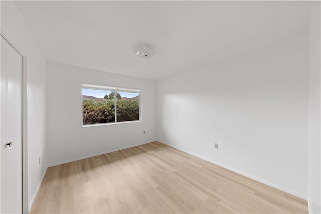 empty room featuring light wood-type flooring