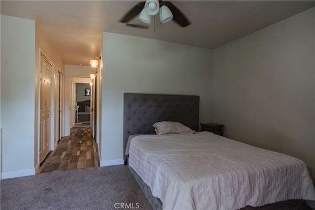 carpeted bedroom featuring ceiling fan