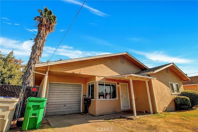 view of front of home featuring a garage