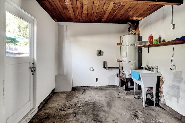 interior space with strapped water heater and wooden ceiling