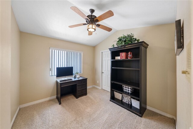 office with ceiling fan, light carpet, and vaulted ceiling