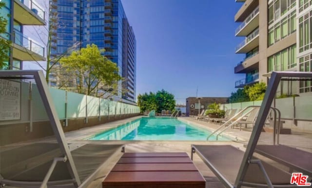 view of pool with a patio area