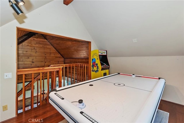 rec room with dark wood-type flooring and lofted ceiling