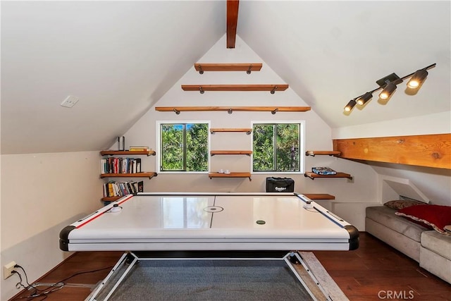 recreation room featuring lofted ceiling with beams and dark hardwood / wood-style floors