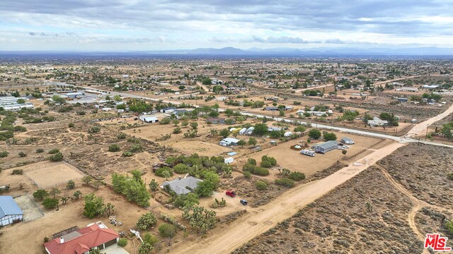 aerial view featuring a mountain view