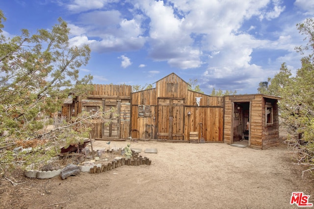 exterior space with an outbuilding