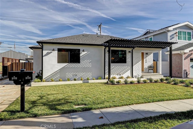 bungalow-style home featuring a pergola and a front yard