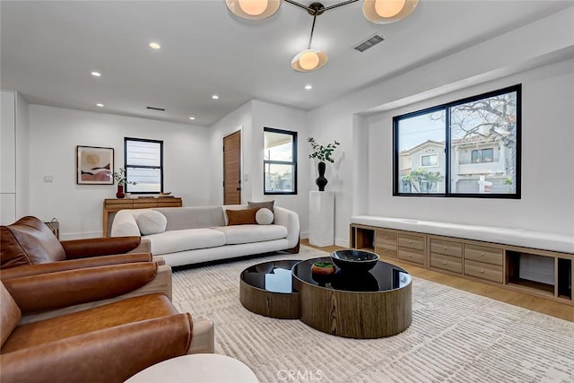 living room with light hardwood / wood-style floors