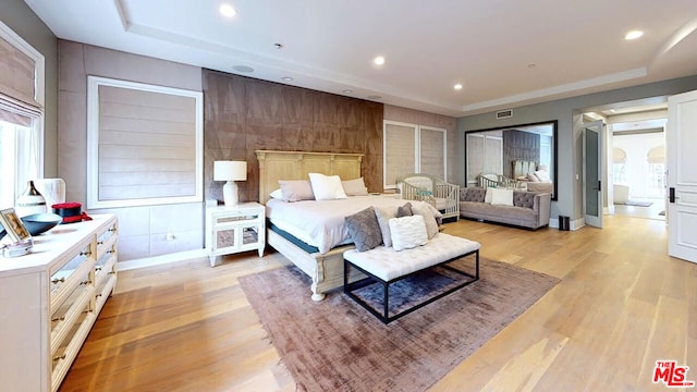 bedroom with light hardwood / wood-style floors