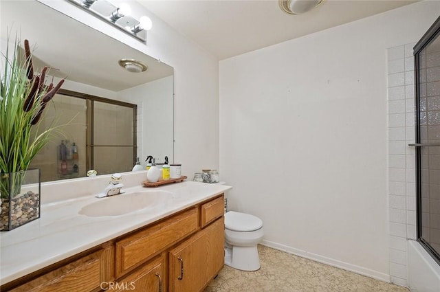 full bathroom featuring vanity, toilet, and shower / bath combination with glass door