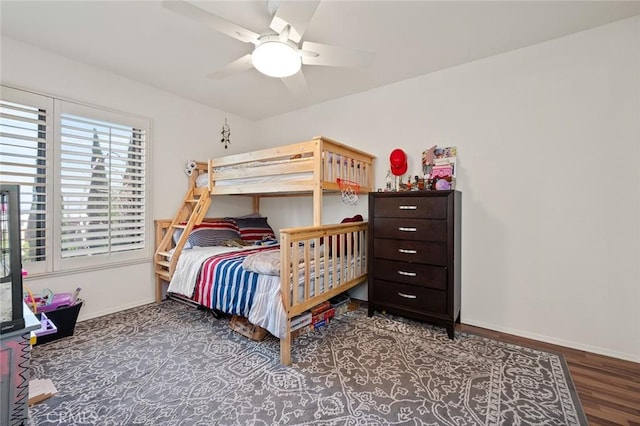 bedroom featuring wood-type flooring and ceiling fan