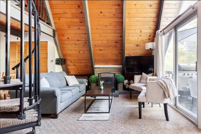 living room with lofted ceiling with beams, wooden walls, wooden ceiling, and carpet flooring