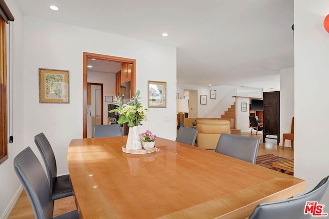 dining area featuring light wood-type flooring