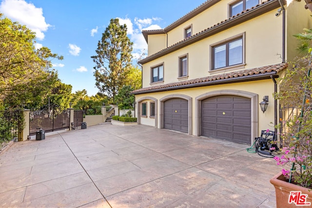 exterior space with a garage