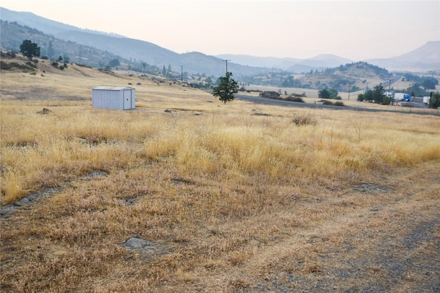 property view of mountains with a rural view