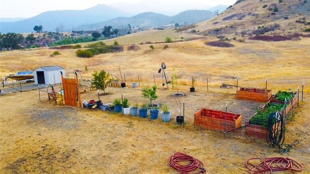 view of mountain feature featuring a rural view