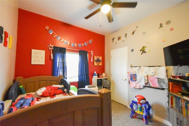 bedroom featuring ceiling fan and carpet floors