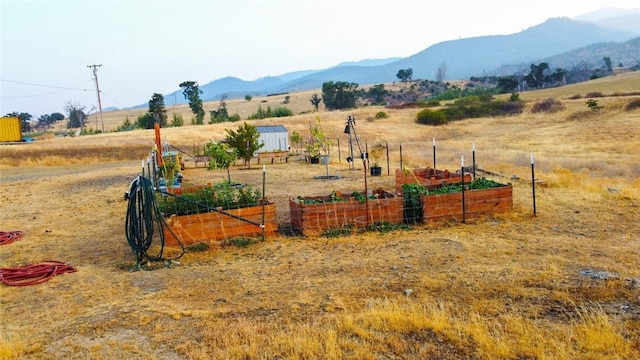 property view of mountains featuring a rural view