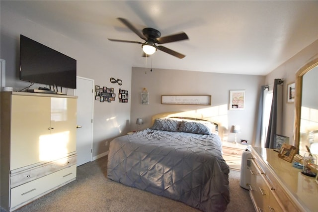 carpeted bedroom with lofted ceiling and ceiling fan